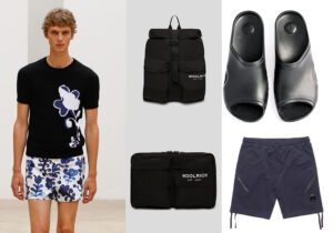total look Arthur Arbesser / zaino-valigia packable di Woolrich / ciabatte 'Pool Rebirth' di Bruno Bordese / shorts CP Company